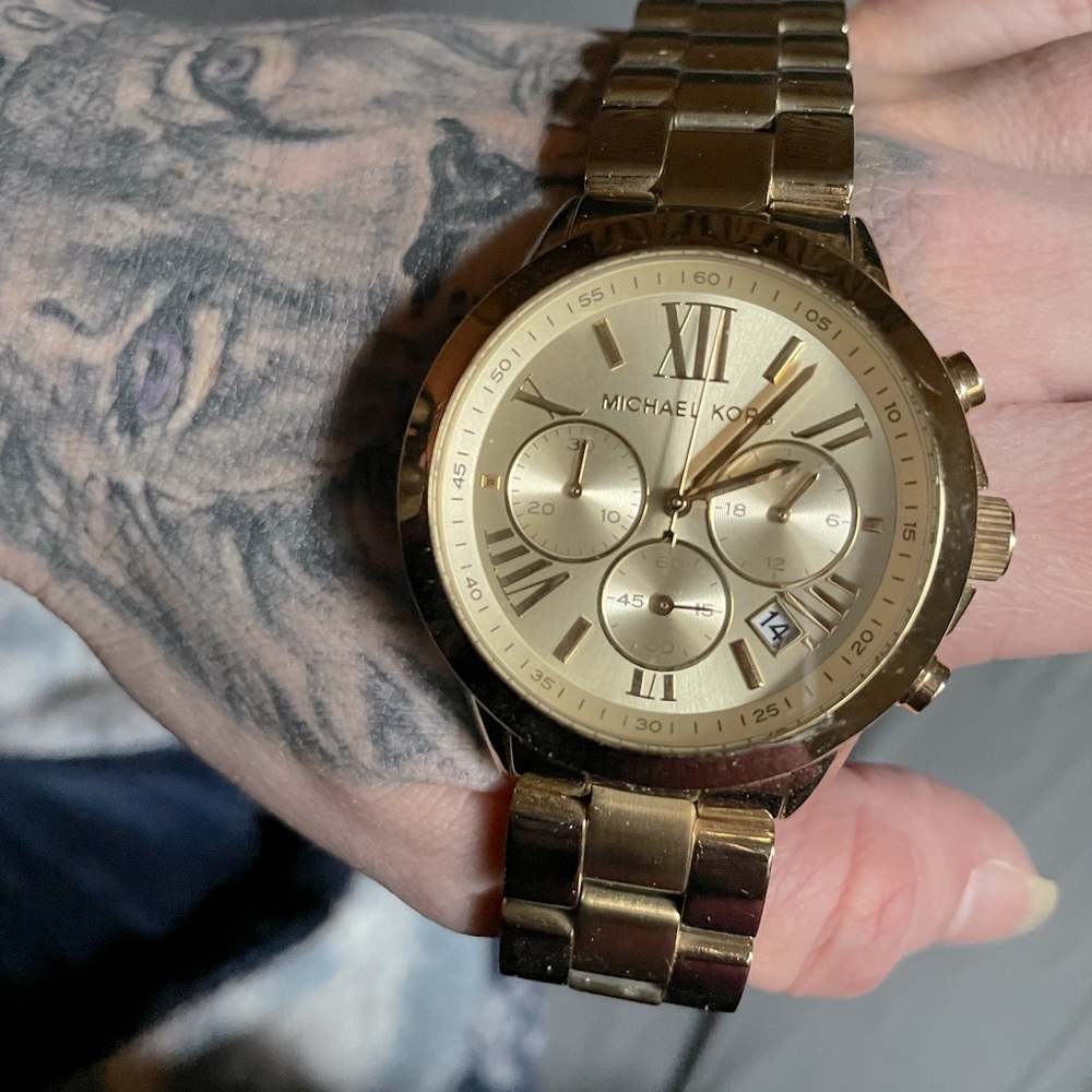 MK gold watch